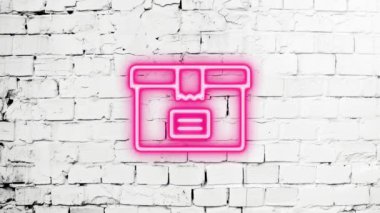 Beyaz duvardaki parlak, neon ışıklı hediye kutusu simgesinin video görüntüleri. Laser Pictogram animasyonu. Kusursuz döngü. 4k video.