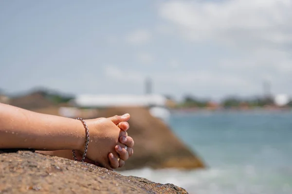 Detail elegant fingers of a woman's hand. 