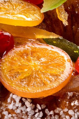 Close up shot of candied fruit on a traditional french galette des rois.