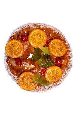 Candied fruit on a traditional french galette des rois on a white background