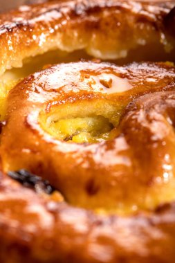 Macro studio shot of a pain aux raisins. Selective focus