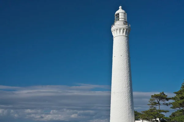 stock image Shimane,Japan - November 7, 2022: Izumo Hinomisaki Lighthouse on blue sky background