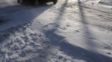 Hokkaido, Japan - January 25, 2023: Taisho rail crossing under strong wind in Nemuro, Hokkaido, Japan.