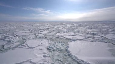 Hokkaido,Japan - February 16, 2023: Drift ice in the offing of the Abashiri port, Hokkaido, Japan