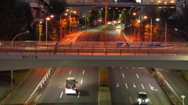 Tokyo, Japonya - 17 Aralık 2024: Tama City, Tokyo, Japonya 'da çalışan bir ambulans