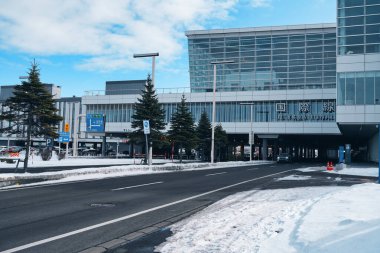 Hokkaido,Japan - February 8, 2025: New Chitose Airport International Terminal bus and taxi stops  clipart