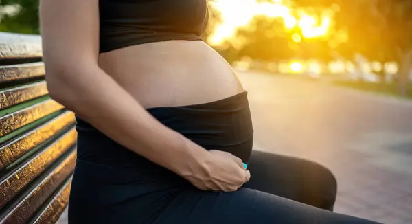 Close Side View Pregnant Woman Belly Sitting Wooden Bench Outdoors — Stock Photo, Image