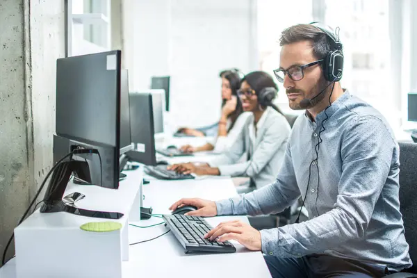 Handsome Young Male Customer Support Executive Working Office — Stock Photo, Image