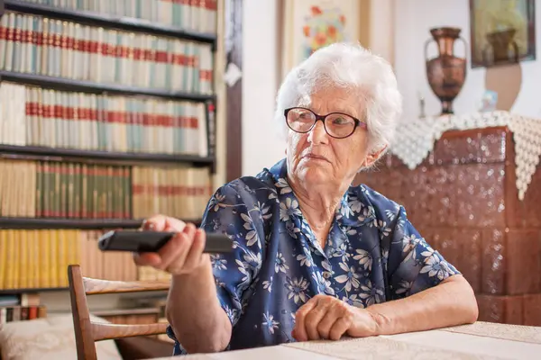 Happy Senior Woman Watching Changing Channel Remote Control Home — Stock Photo, Image