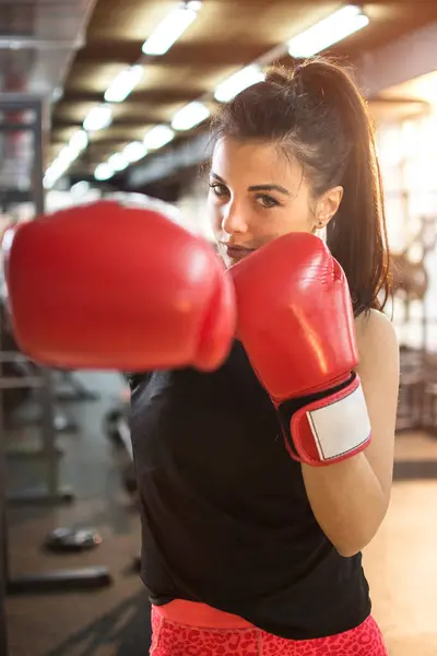 Young Woman Red Boxing Gloves Punching Camera — Stock Photo, Image
