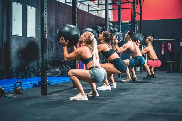 Group Sporty People Doing Squats Fitness Ball Gym — Stock Photo, Image
