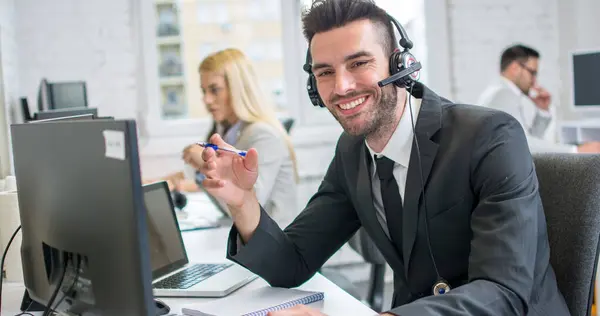 Happy Young Male Customer Support Executive Working Office — Stock Photo, Image