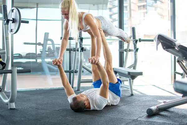 Sporty Couple Exercising Together Gym Male Athlete Carrying Woman His — Photo