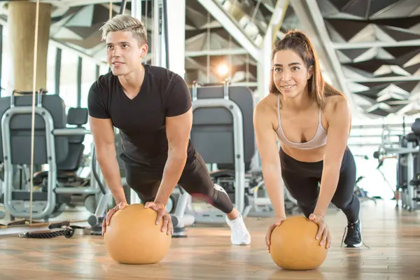 Young Couple Fitness Sportswear Exercising Pilates Ball Gym Sporty Man — Stock Photo, Image