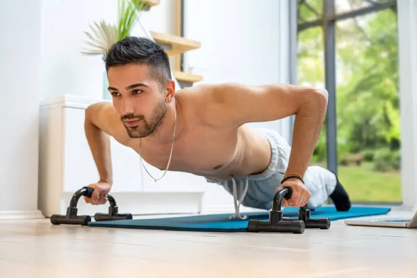 Happy Young Handsome Man Doing Push Exercise Equipments Home — Stock Photo, Image