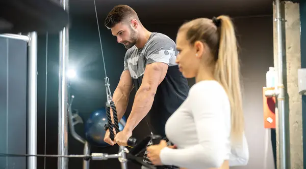 Handsome Tall Guy Pushing Cable Cross Machine Gym — Stock Photo, Image