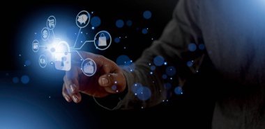 cyber security internet and networking concept. Businessman hand working with VR screen padlock icon on computer background