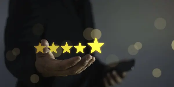 Business people touching five star, customer service and satisfaction concept. Experience and feedback of customers. Rating very impressed.