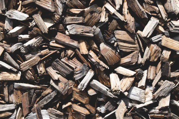 wooden background with bark. saw wood cut piled