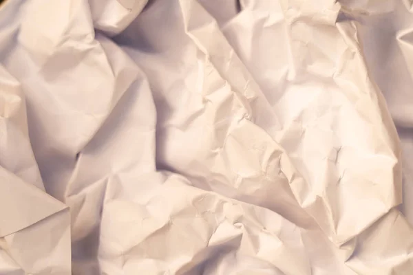 crumpled paper background with bends and top view