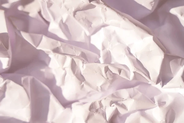 crumpled paper background with bends and top view