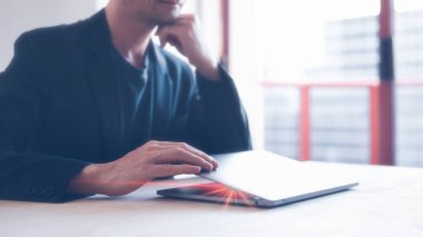 open close computer laptop job finished closing deal concept, businessman closing laptop on white wooden table 
