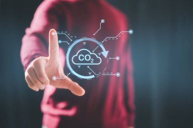 Karbondioksit emisyonunun azaltılması, karbon ayak izi ve karbon kredisi kavramında küresel ısınmayı iklim değişikliğinden sınırlamak için CO2 'ye elle dokunmak sera gazı emisyonlarını azaltır.