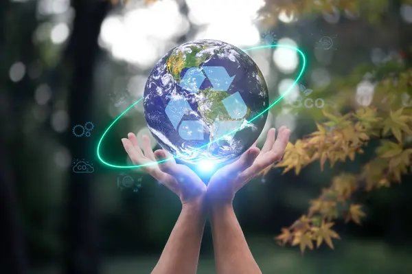 hands holding crystal ball ESG with blurred green autumn background in concept of Environment society and governance sustainable business, multi exposure, Elements of this image furnished by NASA