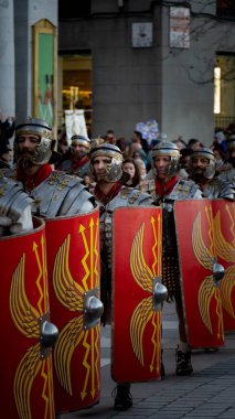 Roman soldiers with their shield in a parade in Madrid