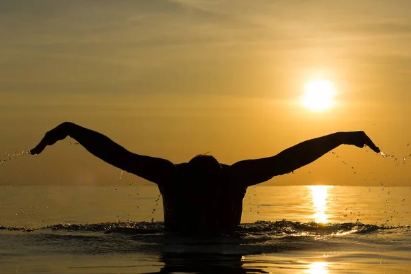 Silhouette Man Swimming Butterfly Stroke Technique Splendid Colorful Sunset Beach — Stock Photo, Image