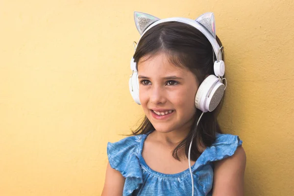 Smiling Little Girl Sitting Cat Ears Design Headphones Cheerful Kid — Stock Photo, Image