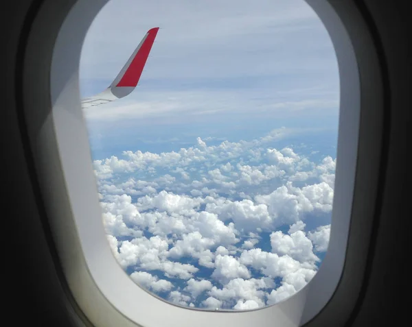 View Plane Blue Sky Fluffy Clouds — Stock Photo, Image