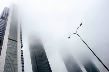 modern office building with skyscrapers and glass in Madrid