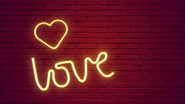 Illuminated and glowing LOVE neon sign Valentines day concept 