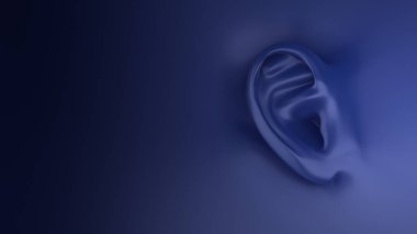 Human ear isolated on a dark background