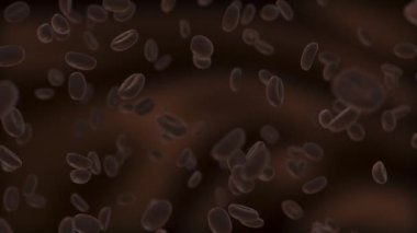 Kahverengi arka planda ağır çekimde dönen kavrulmuş kahve çekirdekleri