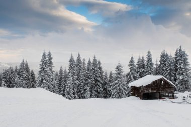 winter mountain landscape with snowy mountains in a snow