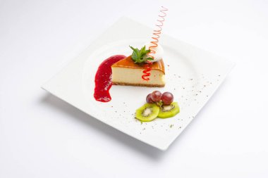 tasty strawberry cheesecake with berries on white background