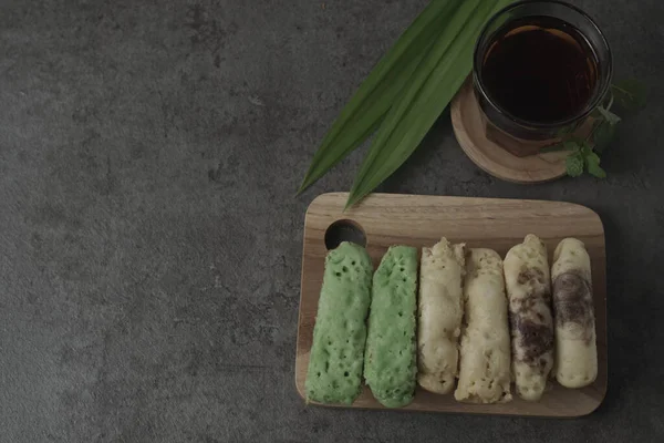 Kue Pukis are traditional Indonesian cakes. Made with a simple batter of eggs, sugar, and flour, these round treats are a sweet addition to any snack time. Enjoy with a cup of tea or coffee.