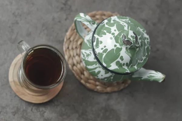Traditional Javanese tea served with palm sugar for a sweet, creamy flavor. Enjoy the authentic taste of Indonesia in every sip. Closeup