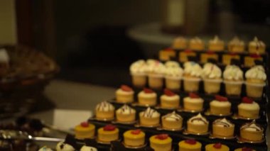 Big set of cupcakes on display