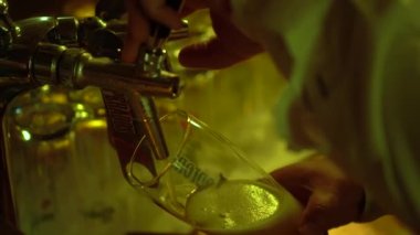 Groom dancing in socks at a wedding party