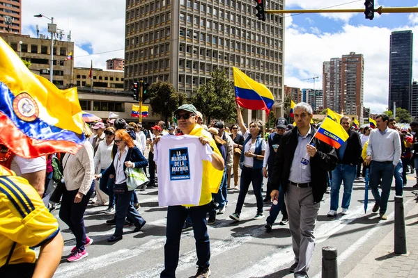 stock image BOGOTA, COLOMBIA - 26 SEPTEMBER 2022. Peaceful protest marches in Bogota Colombia against the government of Gustavo Petro called la marcha de la mayoria. Marches against the law reforms of the new Colombian government.