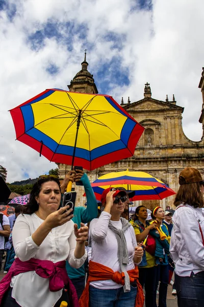 stock image BOGOTA, COLOMBIA - 26 SEPTEMBER 2022. Peaceful protest marches in Bogota Colombia against the government of Gustavo Petro called la marcha de la mayoria. Marches against the law reforms of the new Colombian government.