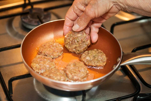 stock image Meat burger preparation. Step by step preparation of mini burgers. Homemade mini burgers for children or appetizers. Small hamburgers.