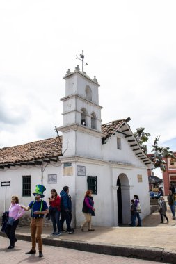 Bogota, Colombia - July 2nd 2023. Tourists at the Hermitage of San Miguel del Principe in the famous Chorro de Quevedo, the location where Gonzalo Jimenez de Quesada first established the foundations of Bogota in 1539.