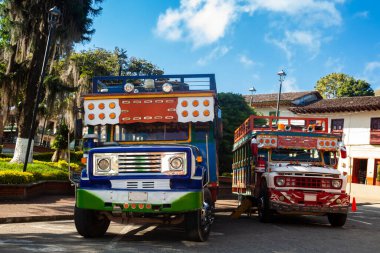 Colorful traditional rural bus from Colombia called chiva clipart