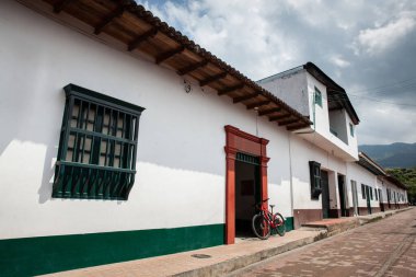View of the beautiful streets of the Heritage Town of Guaduas located in the Department of Cundinamarca in Colombia. clipart