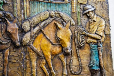 SALAMINA, COLOMBIA - JANUARY 14, 2024:  Detail of a beautiful mural by Fernando Toro Ceballos at the heritage town of Salamina located at the Caldas department in Colombia. clipart