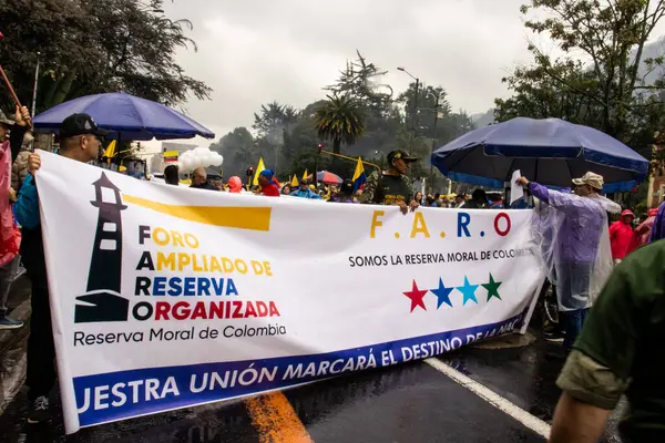 stock image BOGOTA, COLOMBIA - 21 April 2024. March asking for Gustavo Petro impeachment. Peaceful protest march in Bogota Colombia against the law reforms of Gustavo Petro government.
